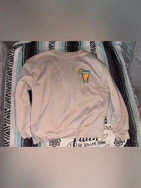 Crewneck Sweatshirt in Cream with Citrus Drink Graphic